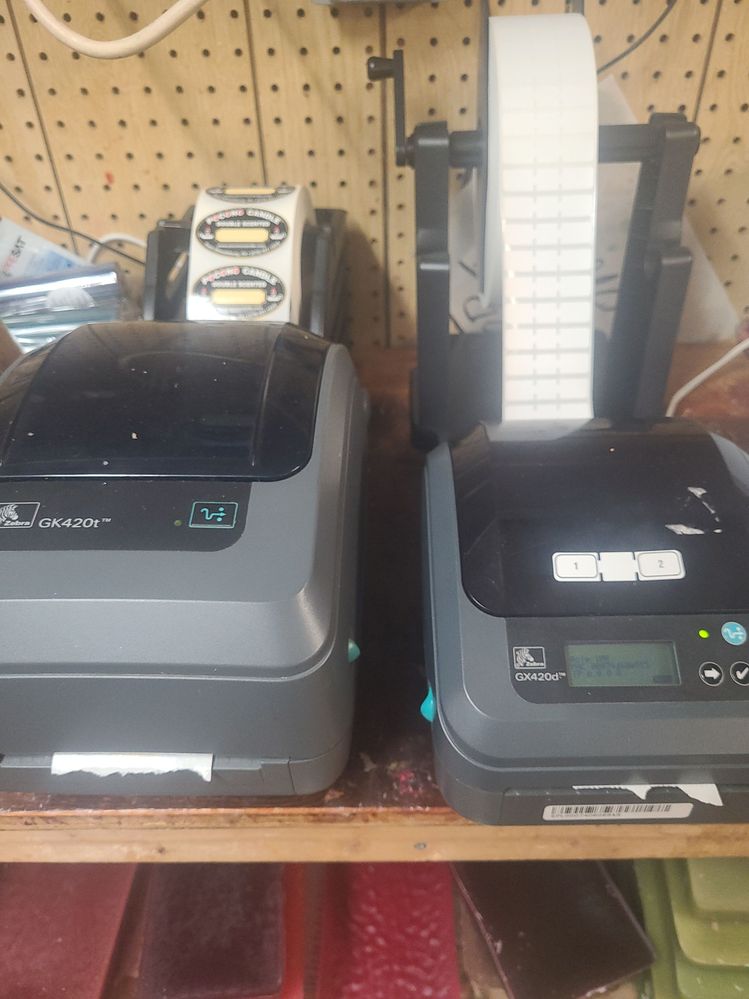 Left is 420T Right is 420D both with roll holders behind printers
