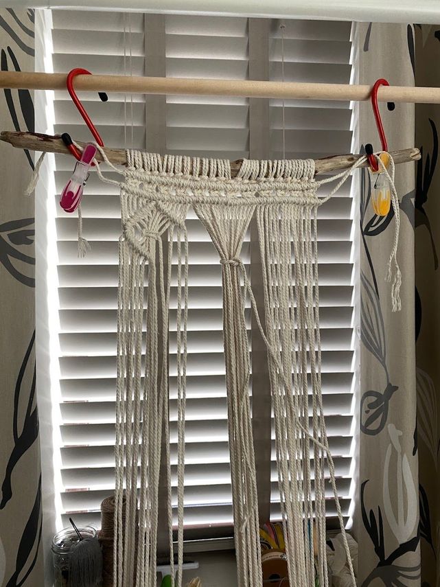 Working on a wall hanging on my Ikea adjustable clothing rack